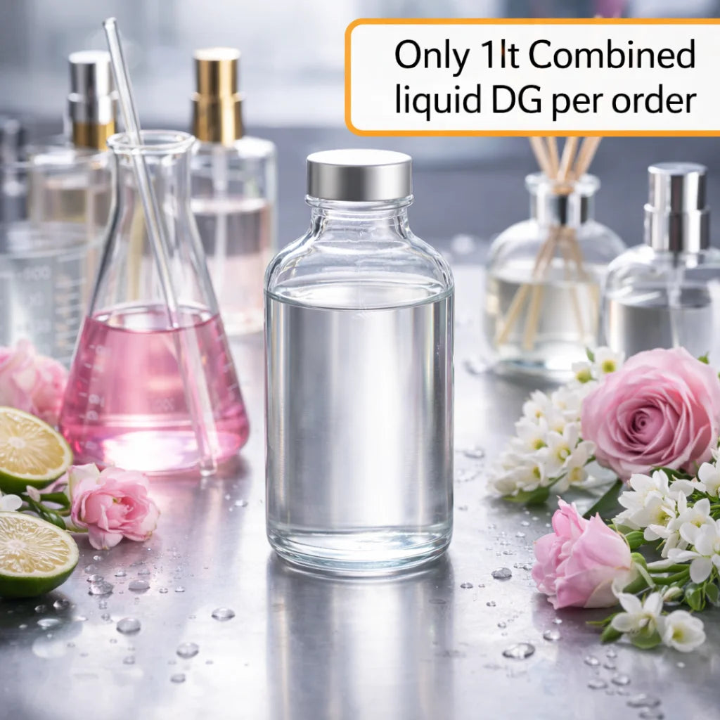 Clear glass bottles containing perfumers alcohol with floral and fruit decorations on a steel bench, with text indicating liquid quantity per order.