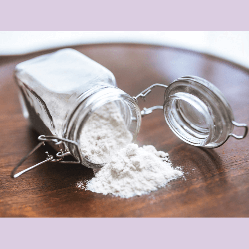 White tapioca starch falling out of a jar