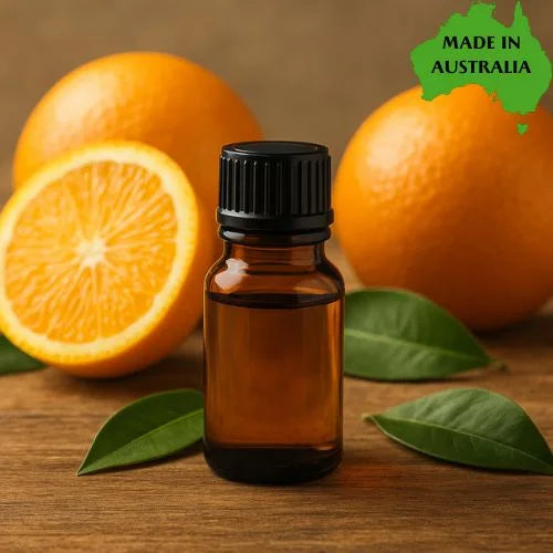 Sweet oranges and essential oil bottle in foreground