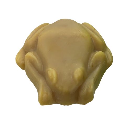 Beige-colored soap bar shaped like a frog on a white background showing the colour YSL Libre turns cold process soap