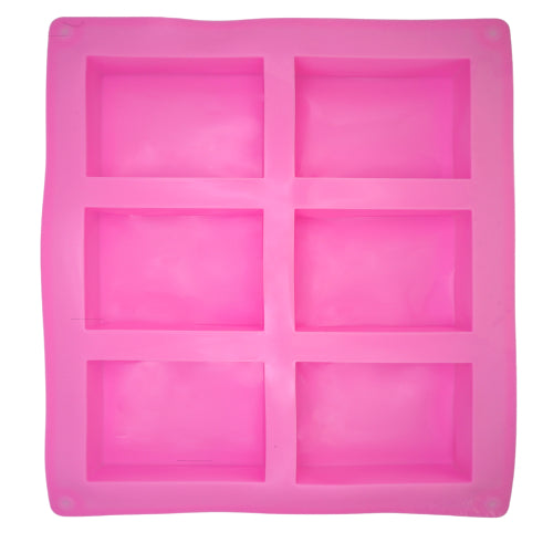 Pink six cavity soap mould shot from above