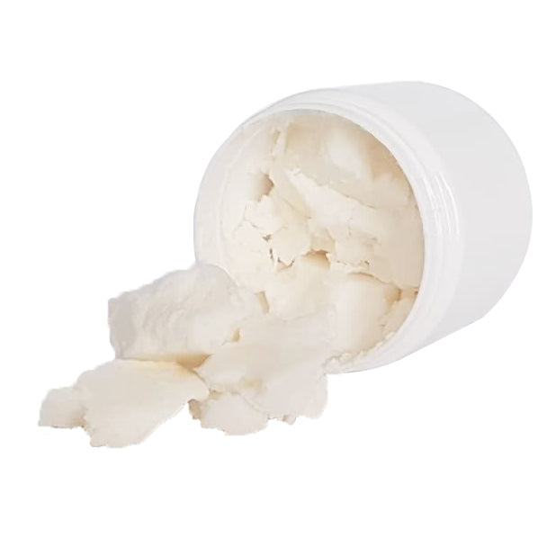 Refined shea butter organic falling out of a container