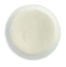 Off white xanthan gum on a plate.