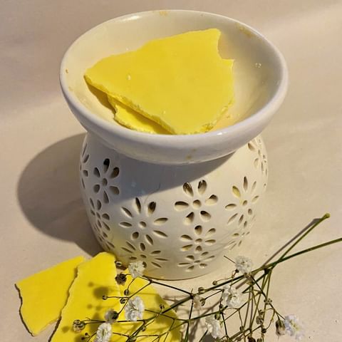 Lemon Myrtle Wax Brittle-yellow shards of scented wax in an oil burner