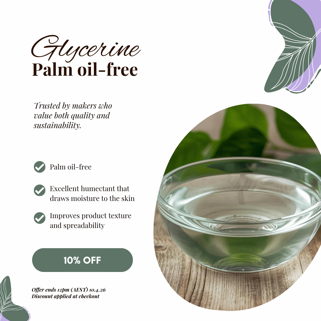 Glycerine palm oil-free product with a glass bowl on a wooden surface, surrounded by green leaves.