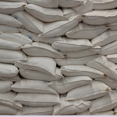 Caustic soda bulk bags stacked in a pile