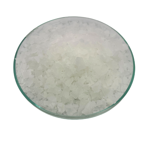 Petri dish filled with magnesium chloride flakes