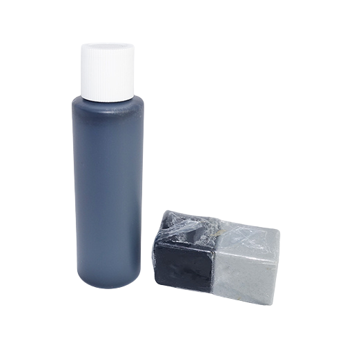 Black liquid soap colour in a bottle and soap samples