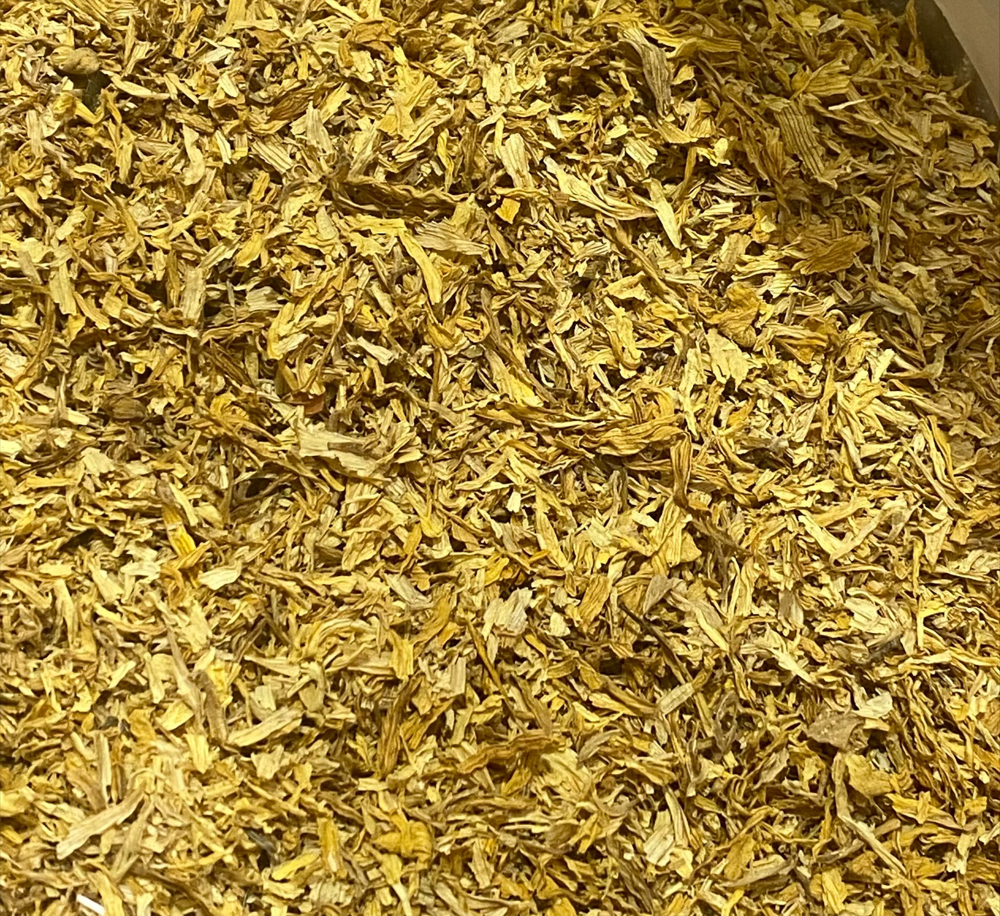 Yellow petals of calendula laid out