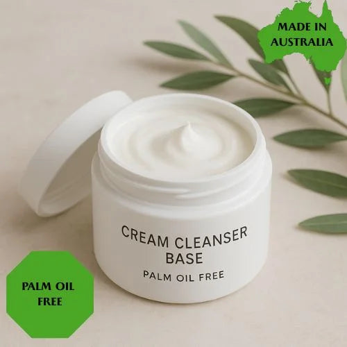 White cream cleanser base jar with green accents and text on a beige background