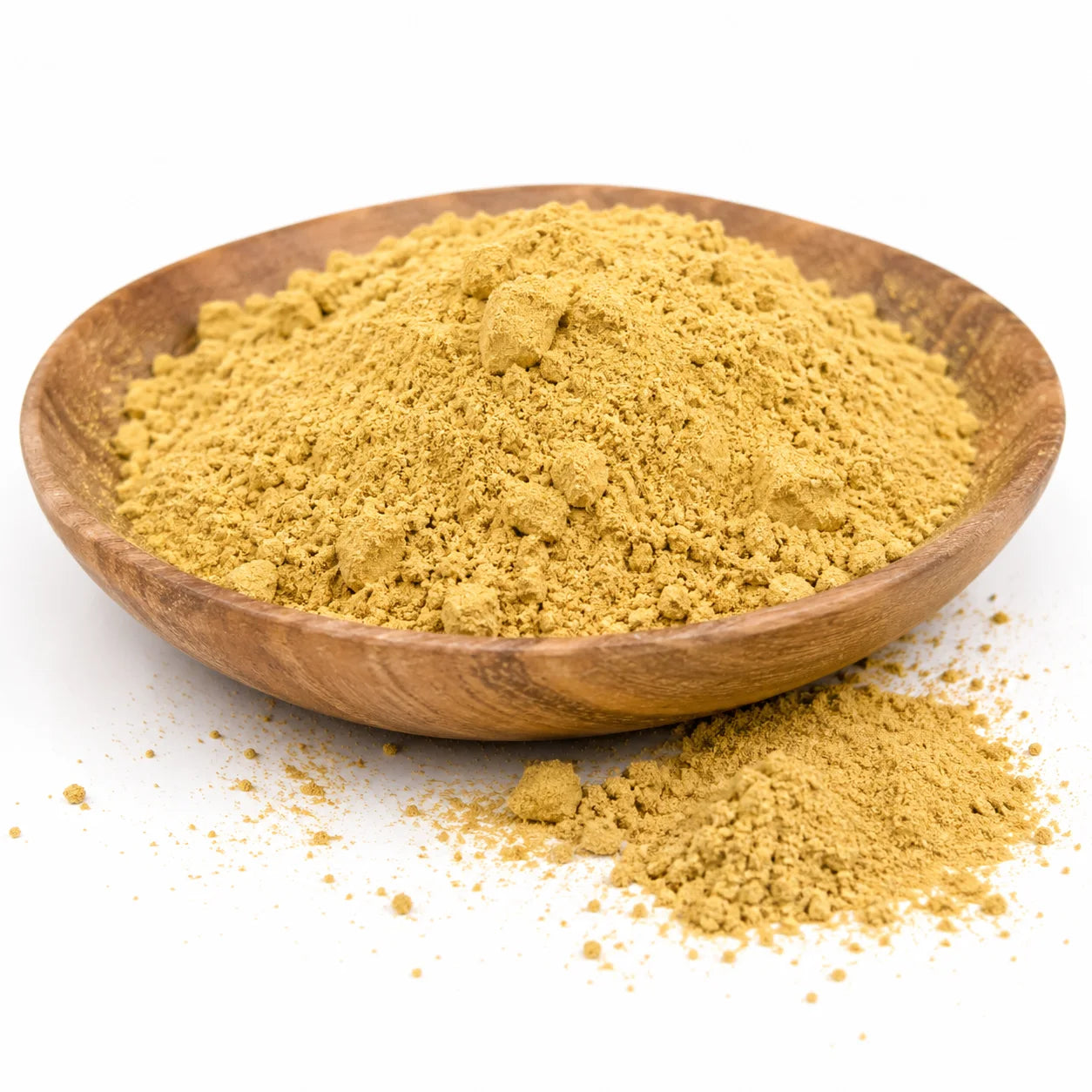 Yellow powdered turkish rhubarb root in a timber bowl