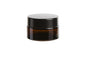 Amber glass lip balm pot with lid on