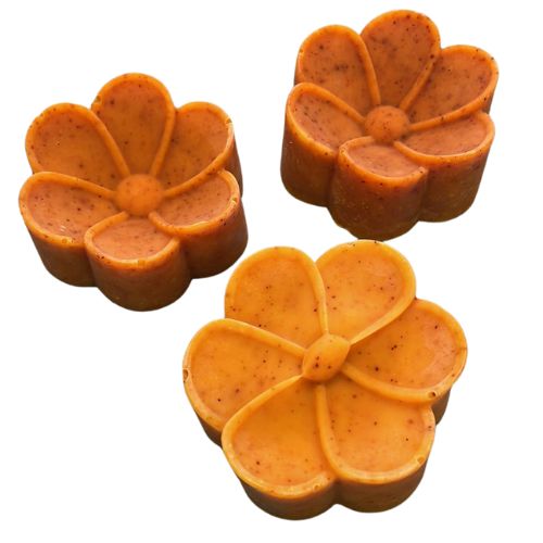 Frangipani shaped soaps showing the colour annatto can be in this medium