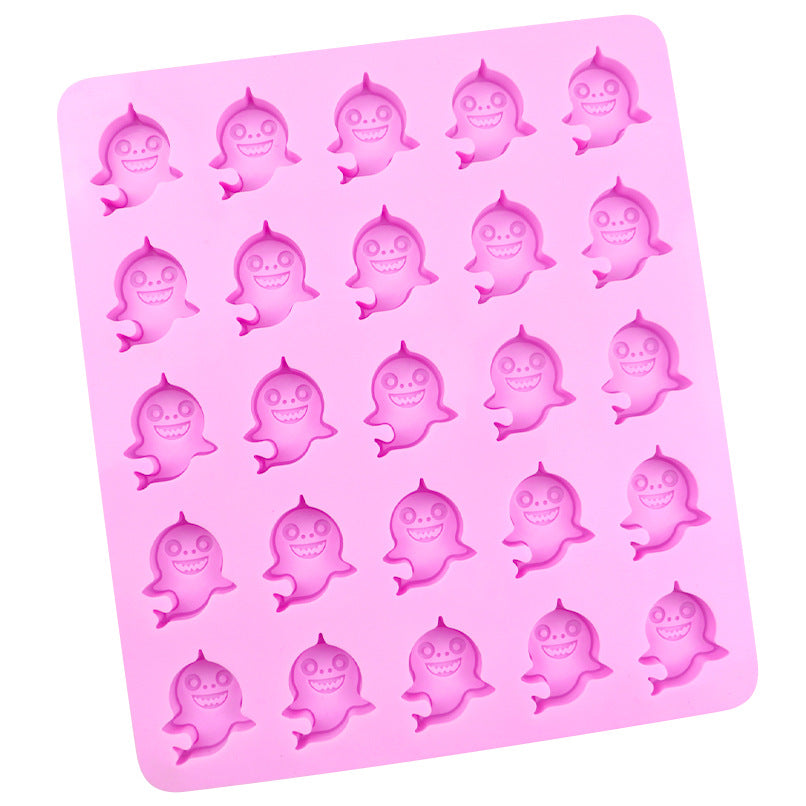 Pink back of mould showing smiling baby shark faces