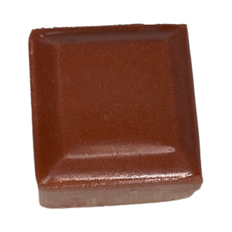 Cube of soap made brown by bronze mica