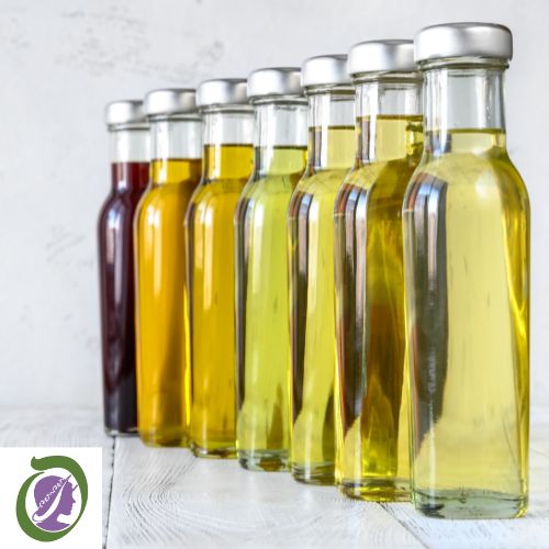 Natural flavour bottles standing in a line on a timber look bench