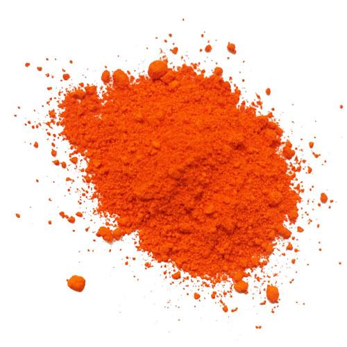 Orange colour powder on a white background