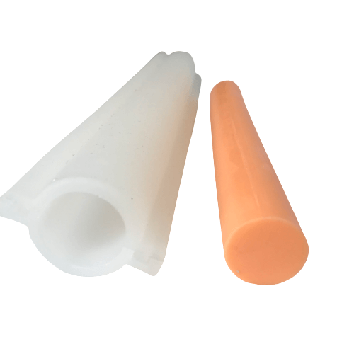 A silicone round embed column mould displayed alongside a bar of soap that was created using this mould.