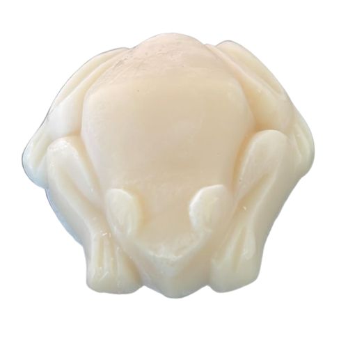 White frog shaped soap showing how shave and a haircut fragrance oil behaves in soap