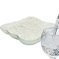 Titanium Dioxide-Water Dispersible in a dish next to a glass of water