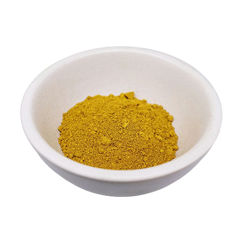 Yellow Oxide in a white bowl