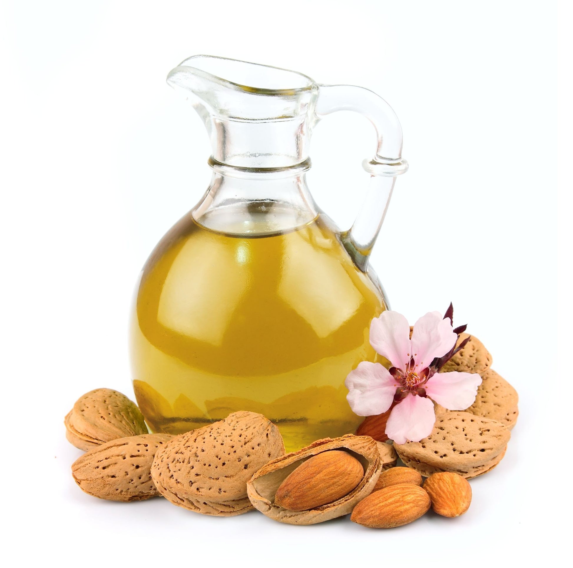 Sweet almond oil is a yellow liquid in a jug