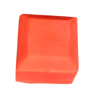 Soap cube coloured with blood orange neon colour