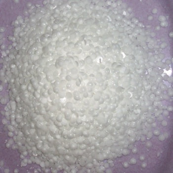 White waxy pellets of Cetyl Stearyl Alcohol