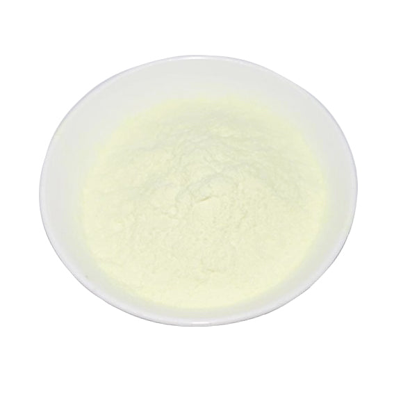 An off white powder of Guar Gum - Cationic on a petri dish