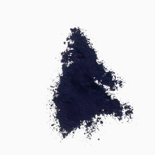 Dark blue indigo powder