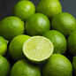 A pile of fresh limes represent Lime Essential Oil - Distilled