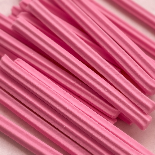 Pink musk sticks to represent Lolly Musk Flavour Oil