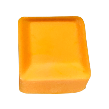 Orange soap cube coloured with Sunrise Neon Powder MMO